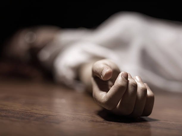 dead-womans-body-with-focus-on-hand