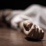 dead-womans-body-with-focus-on-hand